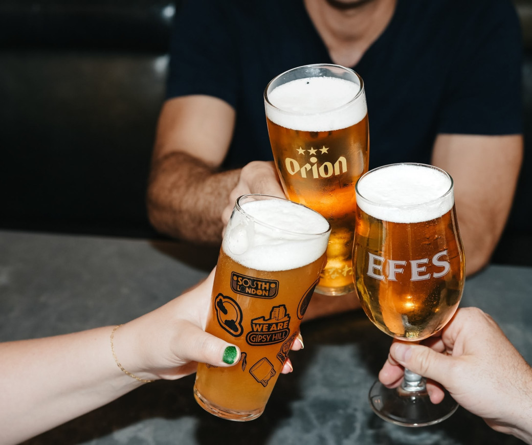 Beers glasses being clinked